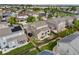 Aerial view of homes with fenced yards, patios, and solar panels in a well-maintained neighborhood at 41 Jordan Ln, Erie, CO 80516