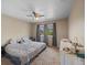 Spacious bedroom with plush carpet, neutral walls, and a ceiling fan for comfort at 41 Jordan Ln, Erie, CO 80516