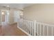Second floor hallway leading to the bedrooms at 41 Jordan Ln, Erie, CO 80516