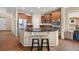 Spacious kitchen island with seating and stainless steel appliances at 41 Jordan Ln, Erie, CO 80516