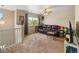 Cozy living room with a ceiling fan, sofa and a large window at 41 Jordan Ln, Erie, CO 80516