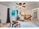 Bright and airy living room with a view of the staircase and natural light at 744 Memphis St, Aurora, CO 80011