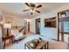 Cozy living room with a view of the eat-in kitchen, perfect for modern living at 744 Memphis St, Aurora, CO 80011