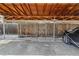 Complex covered parking with wooden beams and wood fence dividers at 1531 S Owens St # 23, Denver, CO 80232