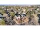 A residential area with lush trees and a home featuring solar panels and a backyard with outdoor seating at 10200 Julian St, Westminster, CO 80031