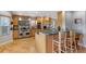 Kitchen featuring a center island with seating and stainless steel appliances at 10200 Julian St, Westminster, CO 80031