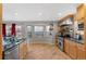 Bright kitchen with stainless steel appliances, granite countertops, and natural light at 10200 Julian St, Westminster, CO 80031