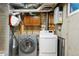 Laundry room with updated appliances at 10200 Julian St, Westminster, CO 80031