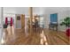 Open-concept living with hardwood floors, natural light, and a spacious dining area at 10200 Julian St, Westminster, CO 80031