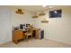Home office with wood desk and carpet at 10200 Julian St, Westminster, CO 80031