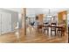 Spacious open-concept living area with hardwood floors and seamless flow between rooms at 10200 Julian St, Westminster, CO 80031