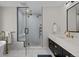 Bathroom with walk-in shower and modern fixtures at 290 Glencoe St, Denver, CO 80220