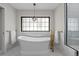 Bathroom with large soaking tub and walk-in shower at 290 Glencoe St, Denver, CO 80220