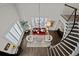 Elegant living room features a stunning chandelier and comfortable seating at 290 Glencoe St, Denver, CO 80220