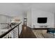 Upper hall with built-in media console and a view down the hallway at 290 Glencoe St, Denver, CO 80220