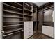 Spacious walk-in closet with ample shelving and hanging space at 290 Glencoe St, Denver, CO 80220