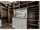 Large walk-in closet with ample shelving and drawers at 290 Glencoe St, Denver, CO 80220