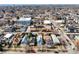 Charming neighborhood aerial view with diverse architecture and mountain backdrop at 3643 Shoshone St, Denver, CO 80211