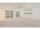 Bright bedroom with carpet, ceiling fan, and natural light offering comfort and functionality at 8220 Lamar Cir, Arvada, CO 80003