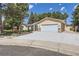 Beautiful one story house with a wide driveway and well-maintained landscaping at 8220 Lamar Cir, Arvada, CO 80003