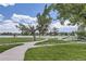 Lake Arbor Park boasts scenic waterfront views, grassy pathways, and a playground at 8220 Lamar Cir, Arvada, CO 80003