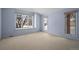 Bedroom with window seat and view of the street at 7329 Windsor Dr, Boulder, CO 80301