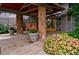 Attractive building entrance with stone columns, landscaping, and covered entryway at 7329 Windsor Dr, Boulder, CO 80301