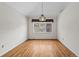 Simple dining room with hardwood floors and light walls at 7329 Windsor Dr, Boulder, CO 80301