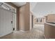 Bright entryway with tiled floors and view of living room at 7329 Windsor Dr, Boulder, CO 80301
