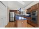 Kitchen with stainless steel appliances and island at 7329 Windsor Dr, Boulder, CO 80301