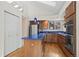 Kitchen boasts stainless steel appliances and island at 7329 Windsor Dr, Boulder, CO 80301