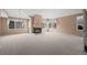 Spacious living room with fireplace and large windows at 7329 Windsor Dr, Boulder, CO 80301