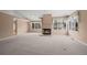 Spacious living room with fireplace and large windows at 7329 Windsor Dr, Boulder, CO 80301