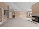Spacious living room featuring a fireplace and vaulted ceilings at 7329 Windsor Dr, Boulder, CO 80301