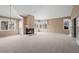Spacious living area with fireplace and access to patio at 7329 Windsor Dr, Boulder, CO 80301