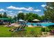 Community pool with lounge chairs and plenty of space for recreation at 7329 Windsor Dr, Boulder, CO 80301