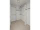 Spacious walk-in closet with ample shelving and hanging rods at 7329 Windsor Dr, Boulder, CO 80301