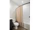 Bright bathroom featuring a shower with white subway tile and updated fixtures at 4180 Kalamath St, Denver, CO 80211
