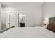 Comfortable bedroom featuring an en-suite bathroom and closet for ample storage at 4180 Kalamath St, Denver, CO 80211
