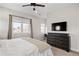 Bedroom with dresser and television at 4180 Kalamath St, Denver, CO 80211