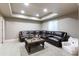 Basement living room featuring comfortable seating and recessed lighting perfect for relaxation at 802 Gamble Oak St, Brighton, CO 80601