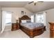 Spacious main bedroom featuring vaulted ceilings, large windows and a statement bed frame at 802 Gamble Oak St, Brighton, CO 80601