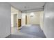 Partially finished basement features finished room and access to additional storage at 9095 Beechwood Dr, Thornton, CO 80229