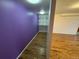 The bedroom includes hardwood floors and large built-in shelving space at 3770 S Ulster St, Denver, CO 80237