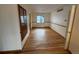 Traditional dining room featuring hardwood floors and a built-in china cabinet at 3770 S Ulster St, Denver, CO 80237