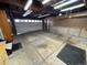Large garage with a lot of storage space and extra lights for easy storage at 3770 S Ulster St, Denver, CO 80237