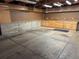 Spacious garage with workbench and built-in shelving for storage needs at 3770 S Ulster St, Denver, CO 80237