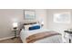 Comfortable bedroom featuring stylish decor, neutral colors, and ample natural light at 1610 Xanthia St, Denver, CO 80220