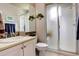 Clean bathroom with a glass-enclosed shower, modern vanity, and stylish fixtures for a comfortable experience at 14200 W 86Th Pl, Arvada, CO 80005