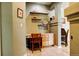Cozy office nook with a built-in desk and shelving, offering a functional workspace in a quiet area at 14200 W 86Th Pl, Arvada, CO 80005